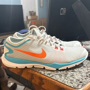 Nike Gray Sneakers with Teal Trim and Orange Swoosh